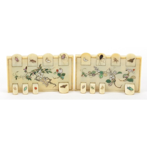 5 - Pair of Japanese carved ivory shibayama gaming markers inlaid with insects and flowers, each 9cm wid... 