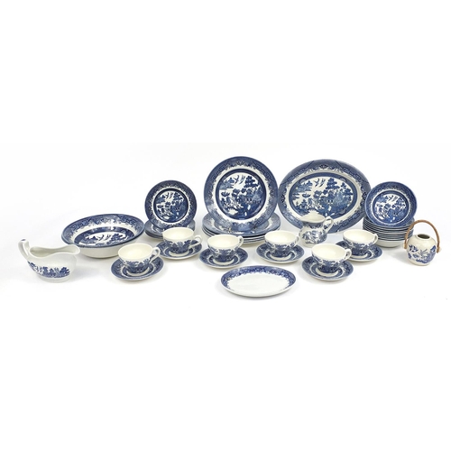 44 - Churchill blue and white Willow pattern dinnerware including platter, dinner plates, cups and saucer... 
