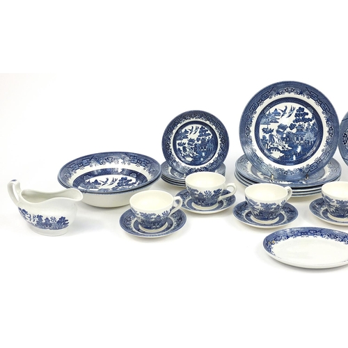 44 - Churchill blue and white Willow pattern dinnerware including platter, dinner plates, cups and saucer... 