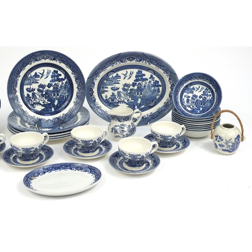 44 - Churchill blue and white Willow pattern dinnerware including platter, dinner plates, cups and saucer... 