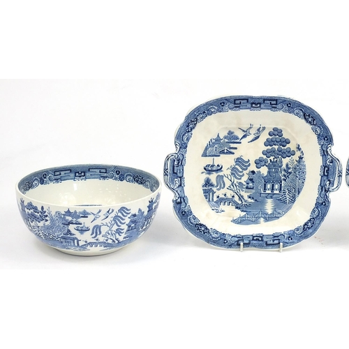 159 - Wedgwood blue and white Willow pattern bowl, two large cake plates and an Old Alton ware blue and wh... 