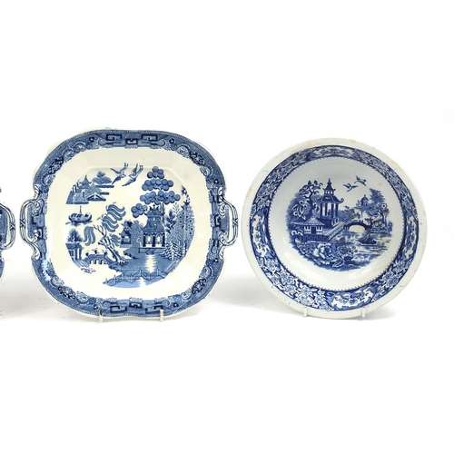 159 - Wedgwood blue and white Willow pattern bowl, two large cake plates and an Old Alton ware blue and wh... 