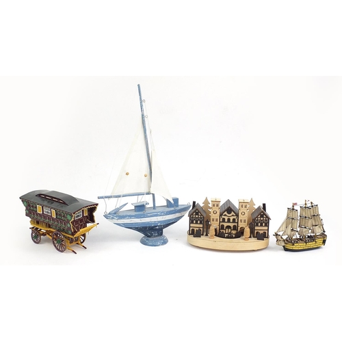 147 - Hand painted wooden model of a Gypsy caravan, blue sailing boat, carved wooden rotating Christmas vi... 