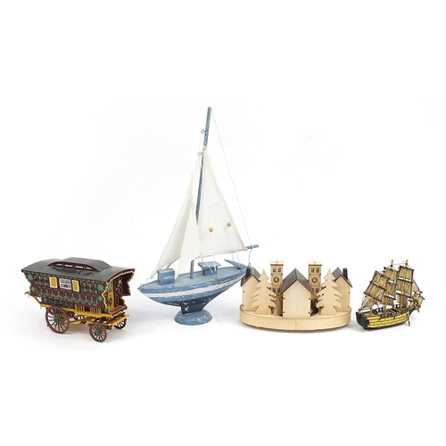 147 - Hand painted wooden model of a Gypsy caravan, blue sailing boat, carved wooden rotating Christmas vi... 