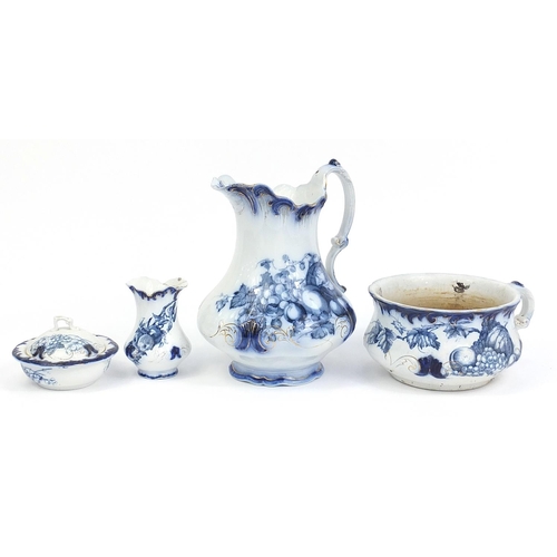 40 - Victorian blue and white fruit design jug, chamber pot, soap dish and toothbrush holder, the jug 30c... 