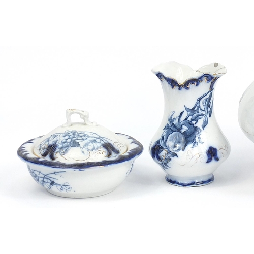 40 - Victorian blue and white fruit design jug, chamber pot, soap dish and toothbrush holder, the jug 30c... 