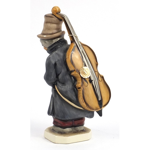 49 - Large Fridel Austrian hand painted pottery model of a cello player, 28cm high