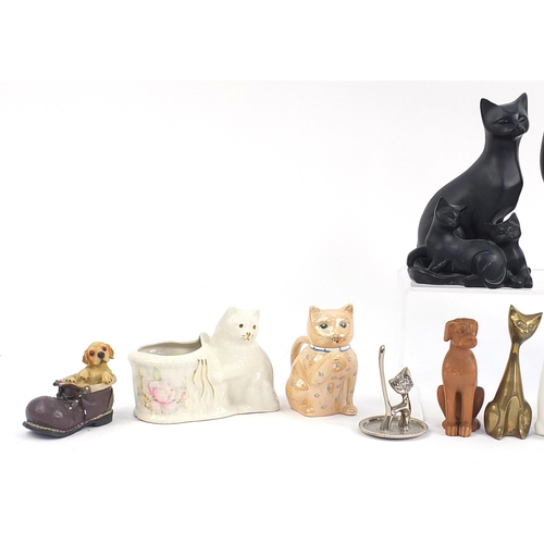 148 - Collectable cats and dogs including floral Staffordshire example, brass, mug etc,  the largest 25cm ... 