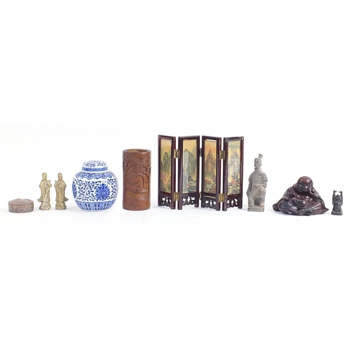 35 - Oriental items including Buddhas, bamboo brush pot, blue and white ginger jar and table screen, the ... 