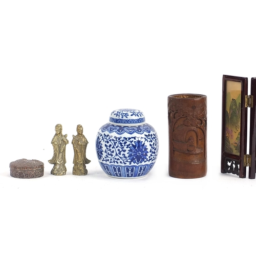 35 - Oriental items including Buddhas, bamboo brush pot, blue and white ginger jar and table screen, the ... 