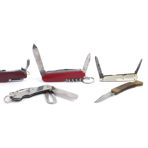 142 - Seven collectable penknives including two Swiss Army examples