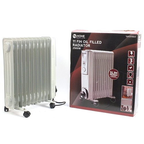 206 - Boxed My Home eleven fin oil filled electric radiator, 56cm high x 46cm wide