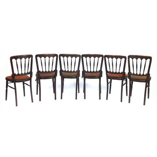 112 - Set of six stained wood stick back chairs with drop in seats, 87cm high