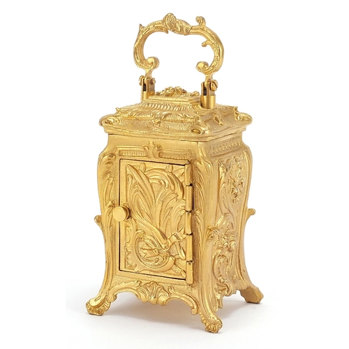 482 - Miniature gilt brass Rococo style carriage clock, 8cm high