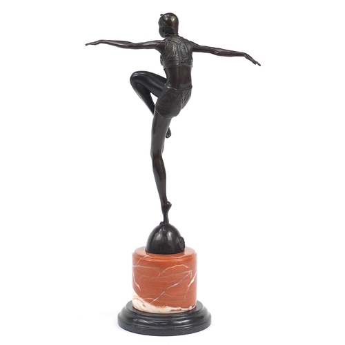 1350 - Large patinated bronze figurine of an Art Deco dancer raised on a marble and black slate base, 56cm ... 