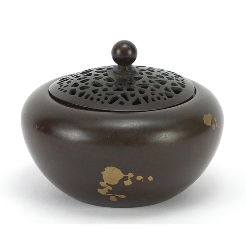 1282 - Chinese gold splashed bronze censer with pierced lid, character marks to the base, 7.5cm in diameter