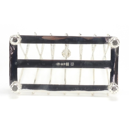 648 - Golf club design six slice toast rack, 15.5cm in length