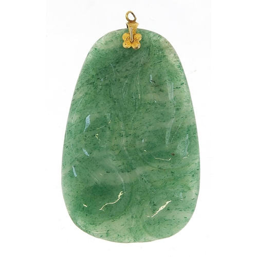 661 - Chinese carved green jade pendant with yellow metal mount, 5cm high