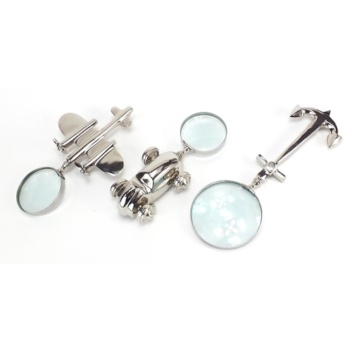 712 - Three novelty silver plated magnifying glasses in the form of an aeroplane, racing car and anchor, t... 