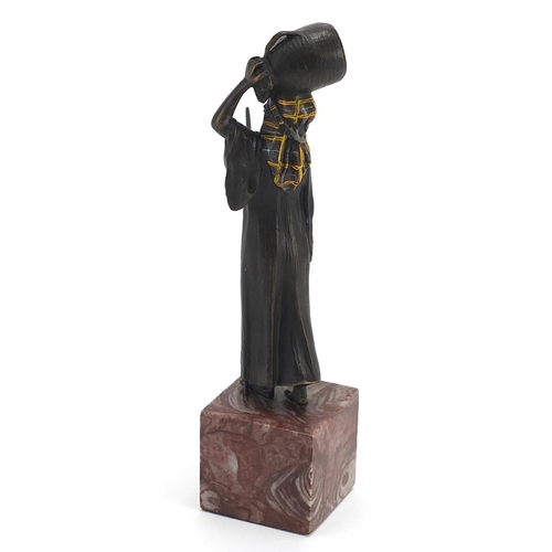 716 - Cold painted bronze figure of a female water carrier raised on a square marble base, 19cm high