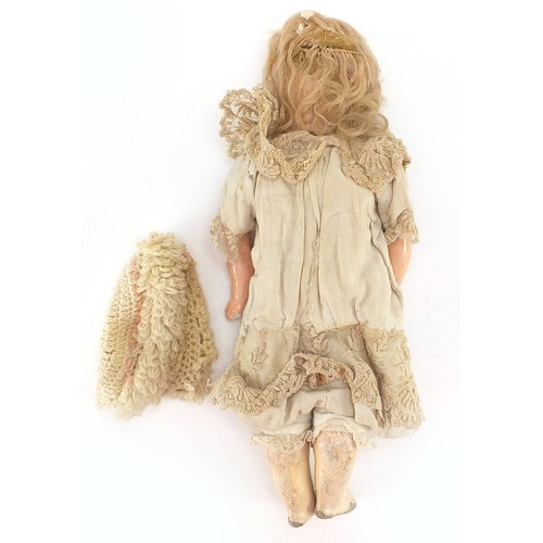 706 - Antique composite doll with jointed limbs, 40cm high