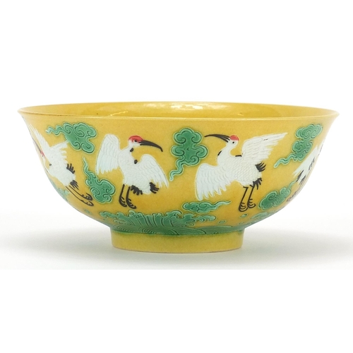 703 - Chinese green ground porcelain bowl hand painted with cranes amongst clouds, six figure character ma... 