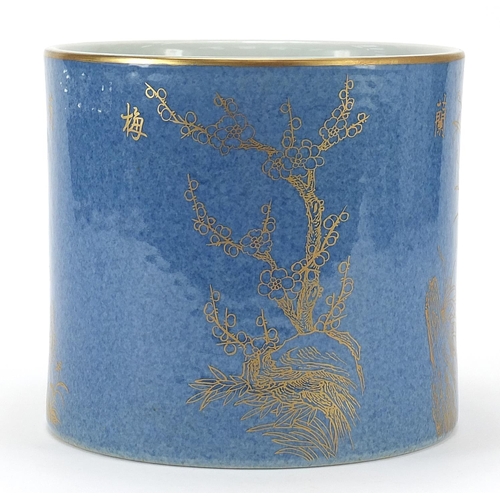 1091 - Chinese porcelain powder blue ground brush pot gilded with trees and flowers, six figure character m... 