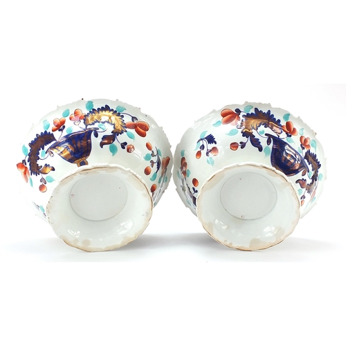 742 - Pair of Victorian ironstone centre bowls decorated with flowers and foliage, each 29cm in diameter