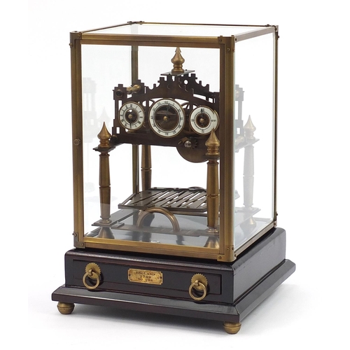 285 - Brass Congreve style rolling ball clock with three enamel dials housed in a glazed display case and ... 