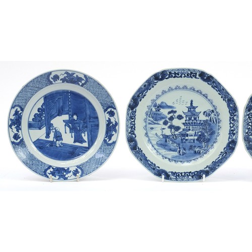 1138 - Four Chinese blue and white porcelain plates including a pair hand painted with pagodas in a river l... 