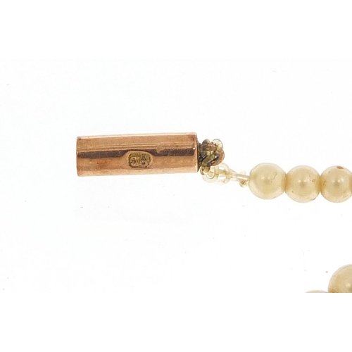 791 - Two vintage simulated pearl necklaces, one with 9ct gold clasp, the largest 42cm in length