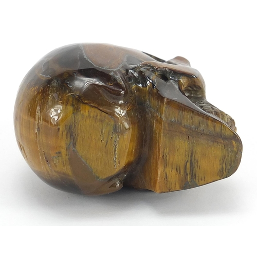 795 - Carved tiger's eye human skull, 7cm in length