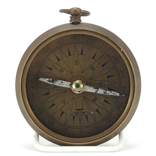 778 - Military interest brass sundial compass housed in a glazed hardwood case, 11cm wide