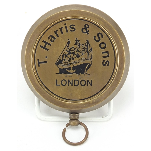 778 - Military interest brass sundial compass housed in a glazed hardwood case, 11cm wide