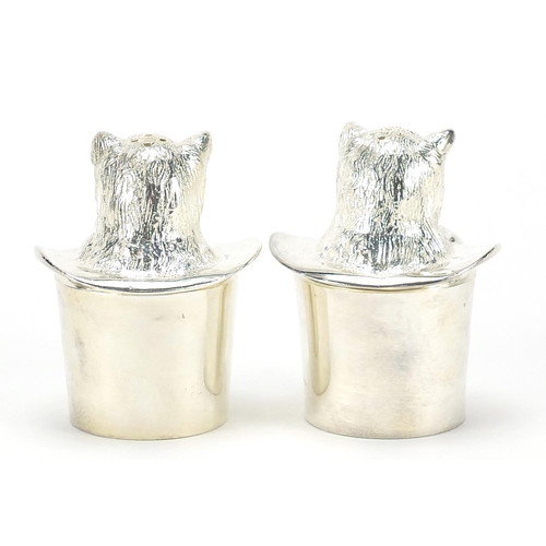 793 - Pair of novelty silver plated cat in a hat design salt and pepper cellars, the largest 7cm high