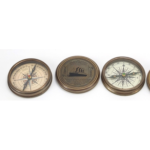 780 - Three naval interest brass compasses including two German style examples, each 7.5cm in diameter