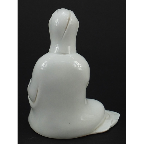 763 - Chinese porcelain figure of Guanyin having a blanc de chine glaze, 12.5cm high