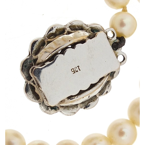 2194 - Cultured pearl necklace with 9ct white gold aquamarine clasp, 45cm in length, 36.2g