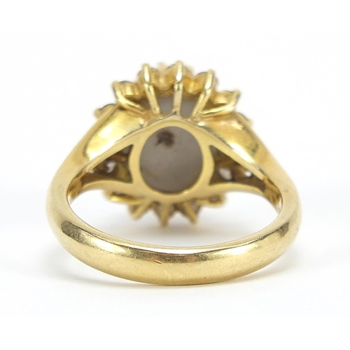 1756 - 18ct gold cabochon star sapphire and diamond ring with pierced shoulders, size O, 8.3g