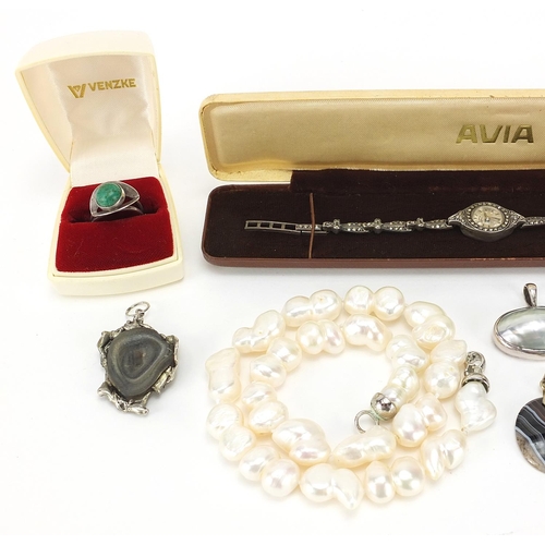 713 - Costume jewellery including a ladies Rotary silver marcasite wristwatch, freshwater pearl necklace a... 