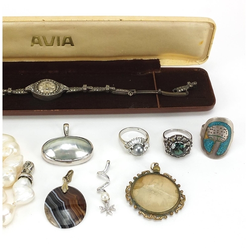 713 - Costume jewellery including a ladies Rotary silver marcasite wristwatch, freshwater pearl necklace a... 