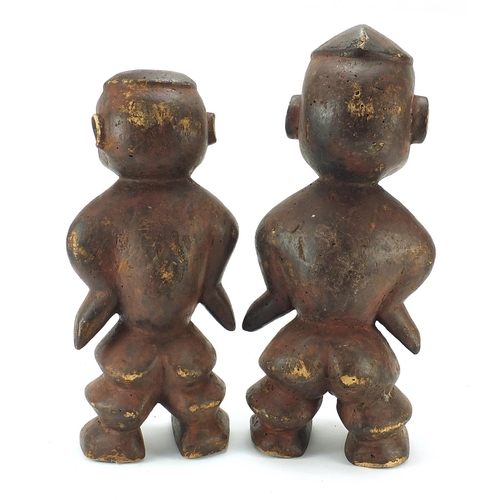 1170 - Pair of tribal interest carved hardwood fertility figures, the largest 50cm high