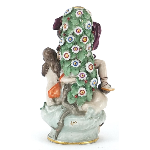 214 - 19th century porcelain figural scent bottle in the style of Chelsea, 10.5cm high