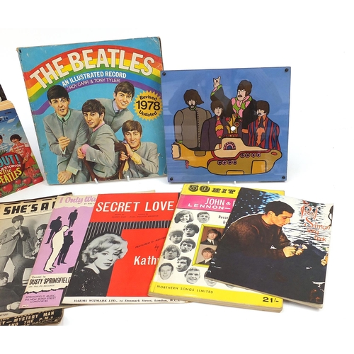 1038 - The Beatles related ephemera and a hand painted wooden plaque including The Beatles Complete