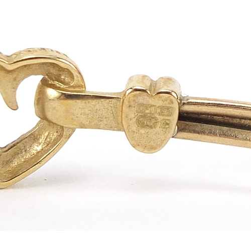 1915 - 9ct gold love heart bangle, 5.9cm wide, 4.7g