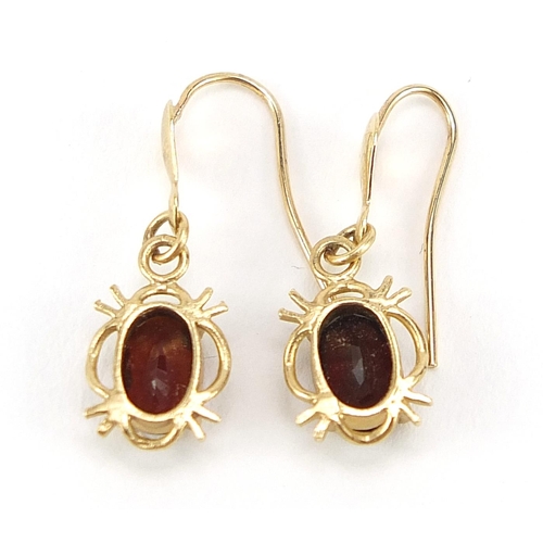 2077 - Pair of unmarked gold garnet drop earrings, 2.1cm high, 0.9g