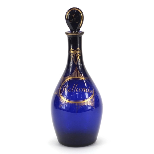 46 - 18th/19th century Bristol blue glass decanter with gilt decoration, inscribed Hollands, 23cm high