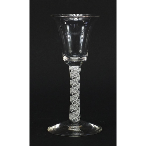 42 - 18th century wine glass with bell shaped bowl and multiple opaque twist stem, 16cm high