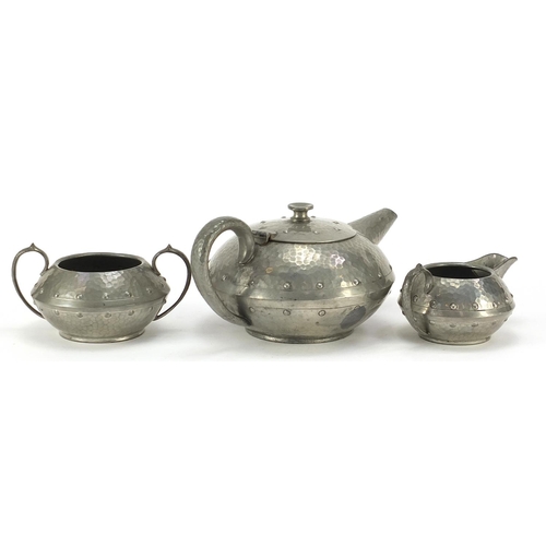 801 - Arts & Crafts baronial pewter tea set, the largest 23.5cm in length