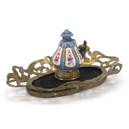 444 - 19th century Paris porcelain Aladdin's oil lamp on a brass stand engraved with foliage, the oil lamp... 